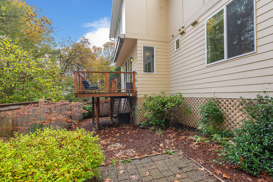 This small yard is fully fenced and abuts a greenbelt.