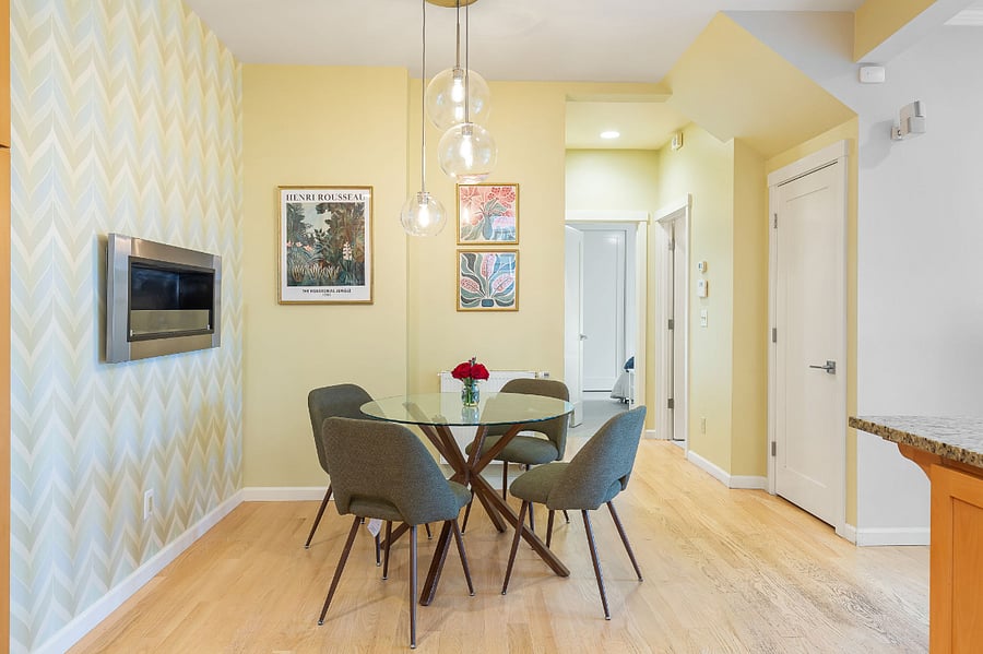 Dining room seats 4 comfortably and features a built-in alcohol based fireplace that kicks off a lot of warmth and comfort in the colder months.