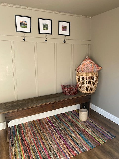 Usable space in a chic and adorable mudroom, perfect for keeping things tidy while charming.