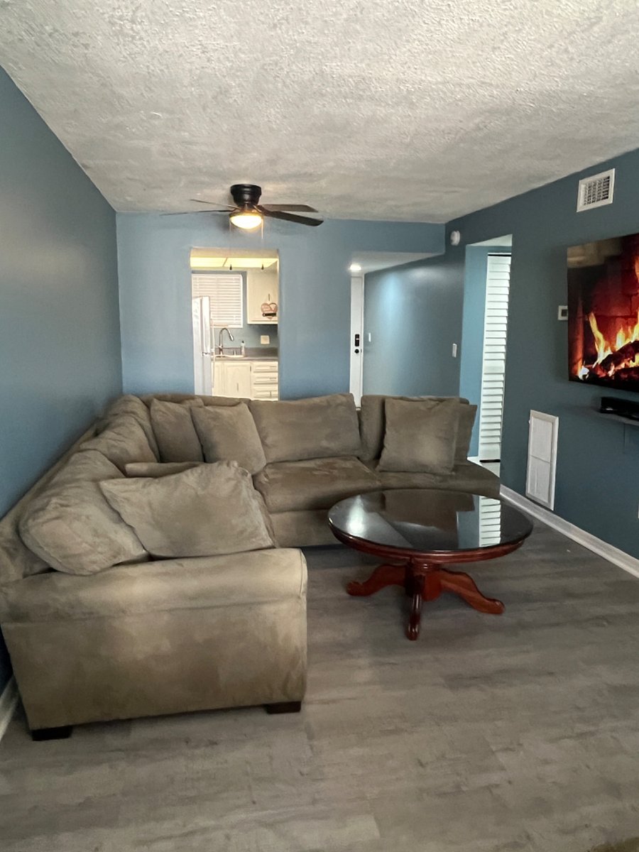 Living Room with large sectional
Couch & SMART TV 