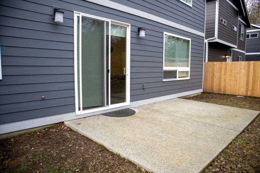 Small patio and backyard area