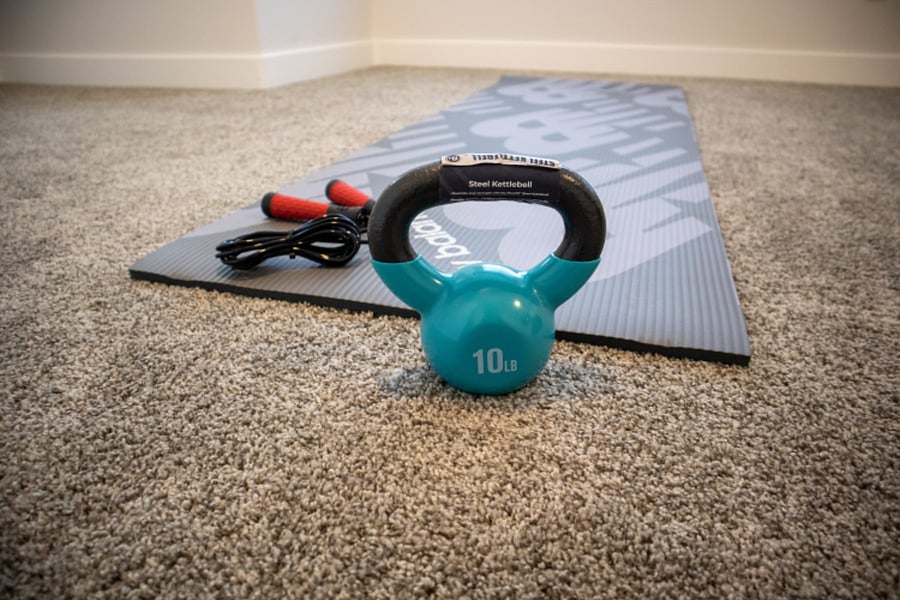 A yoga mat and exercise equipment for guest use