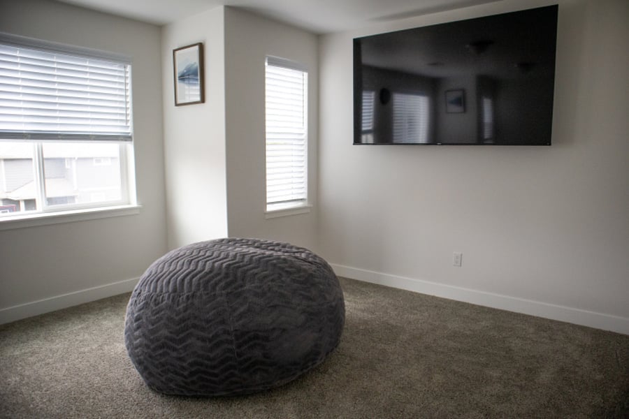 Relax on a large, comfy bean bag while watching TV