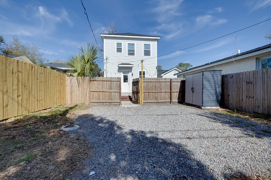 Parking area off alleyway behind home