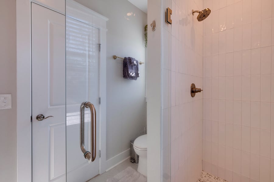 Master bathroom shower and toilet area