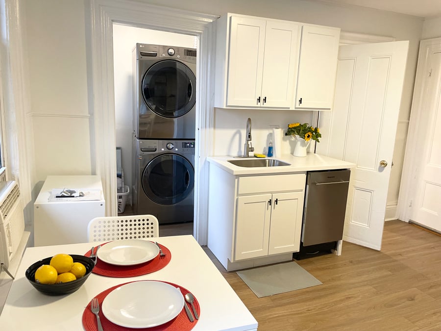 Kitchen with view of laundry room