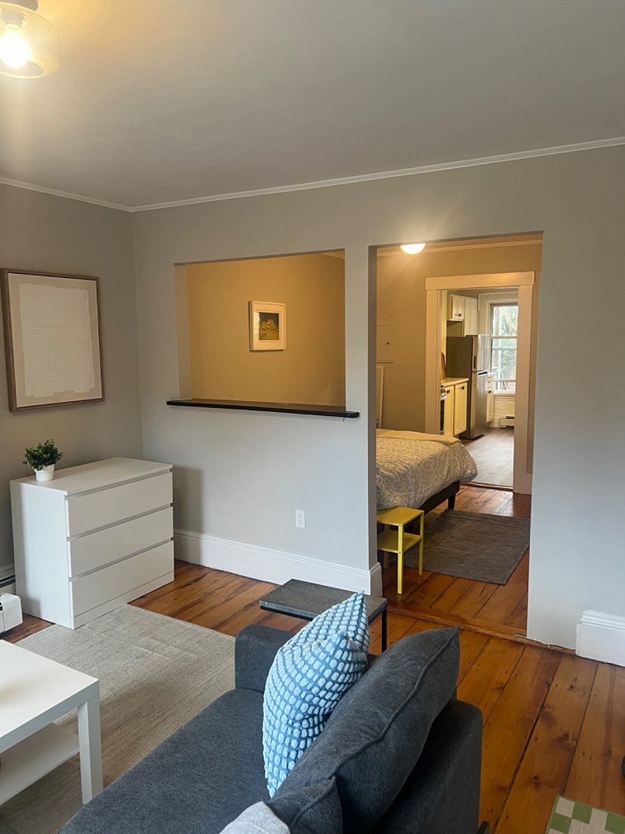 View of bedroom and kitchen from living room
