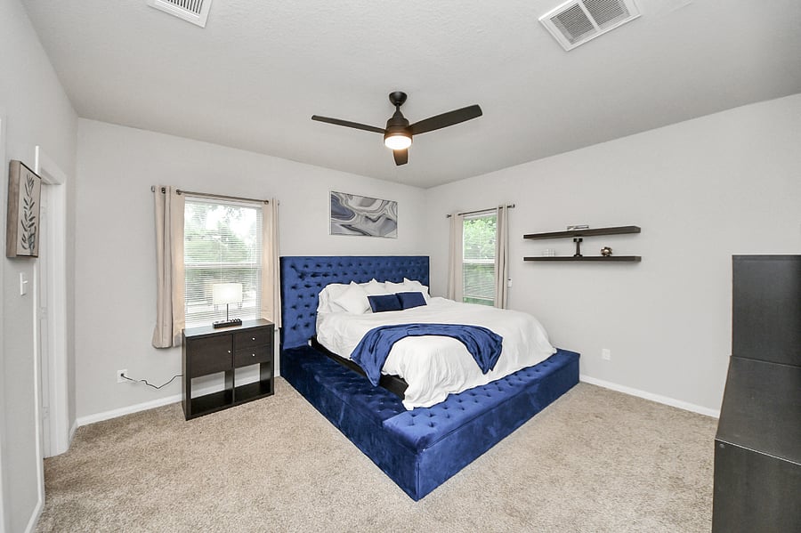 Unit B: Master bedroom with Super comfortable King size bed with storage around the base.