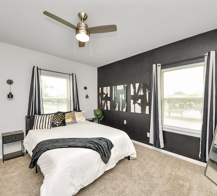 Unit B: Secondary room with a Queen size bed and blackout curtains.