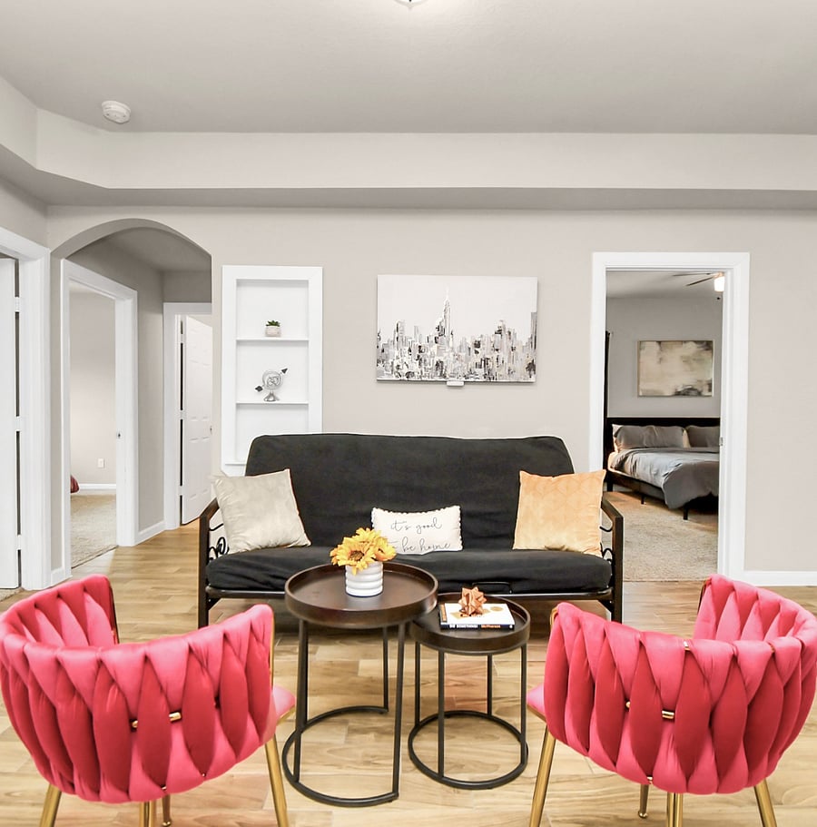 Seating area with a Full sized futon.