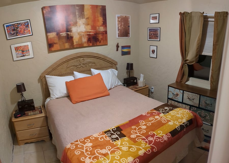 new queen bed, two, two-drawer night stands, 7-drawer standing chest of drawers, plus 5-foot closet (not shown)