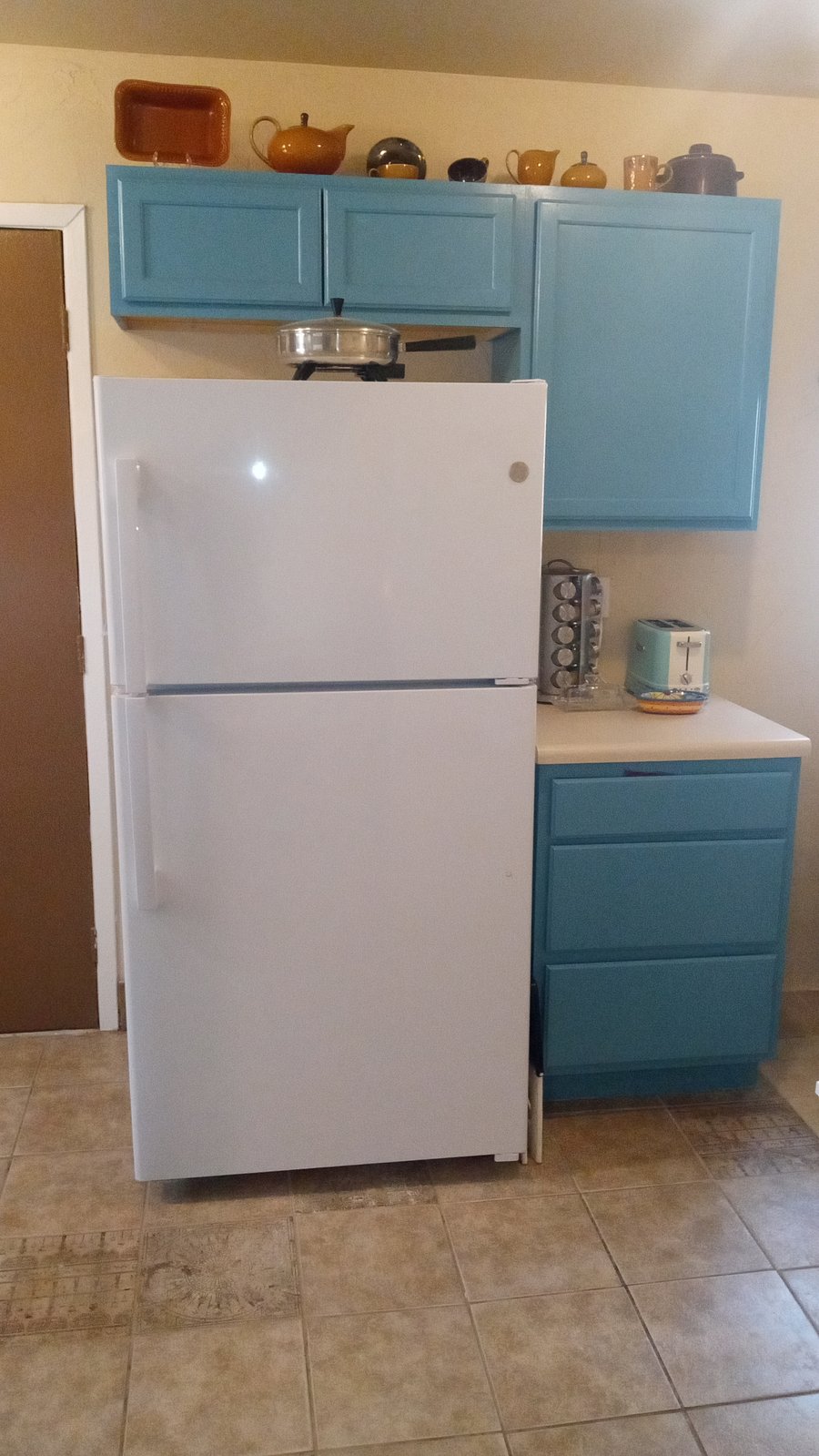 Full size refrigerator, toaster.