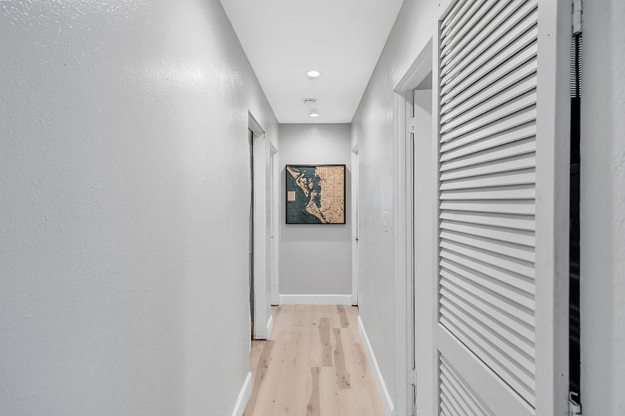 Hall to bedroom, bath to the left.