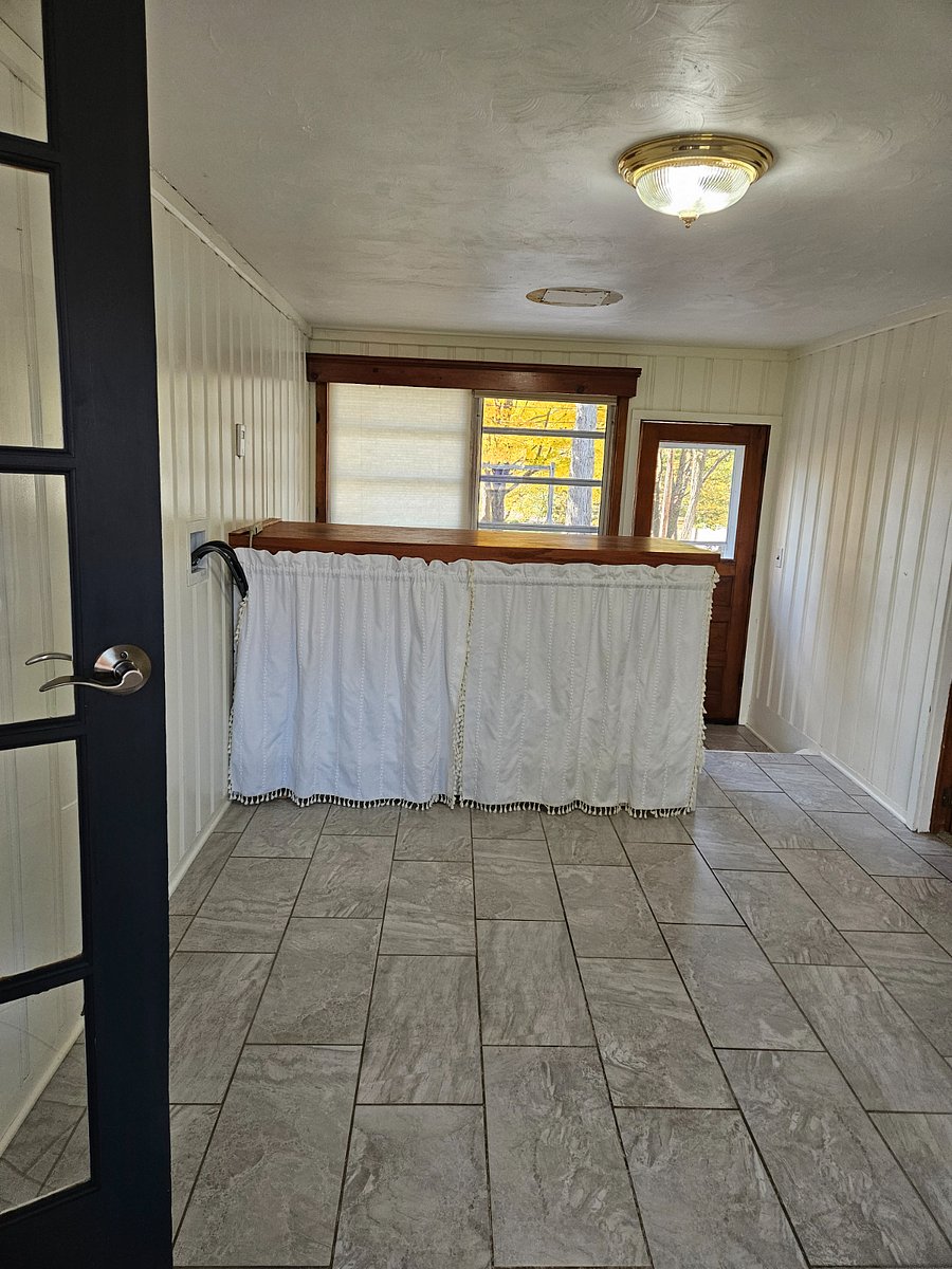 Dryer and washer, right outside tenant bedroom door.
