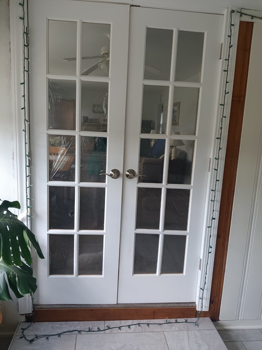 French doors to kitchen in your foyer entry.