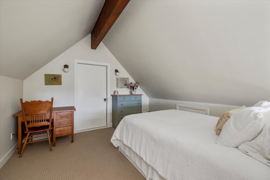 Loft with bed, desk and dresser