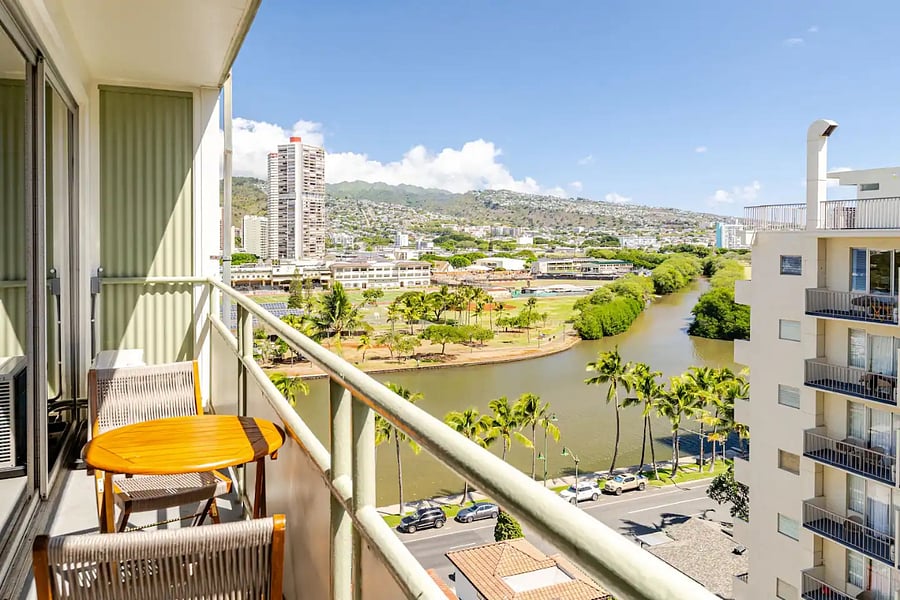 Lanai with canal and mountain views. Ala Wai and the Ko'olau Range from the 11th floor.