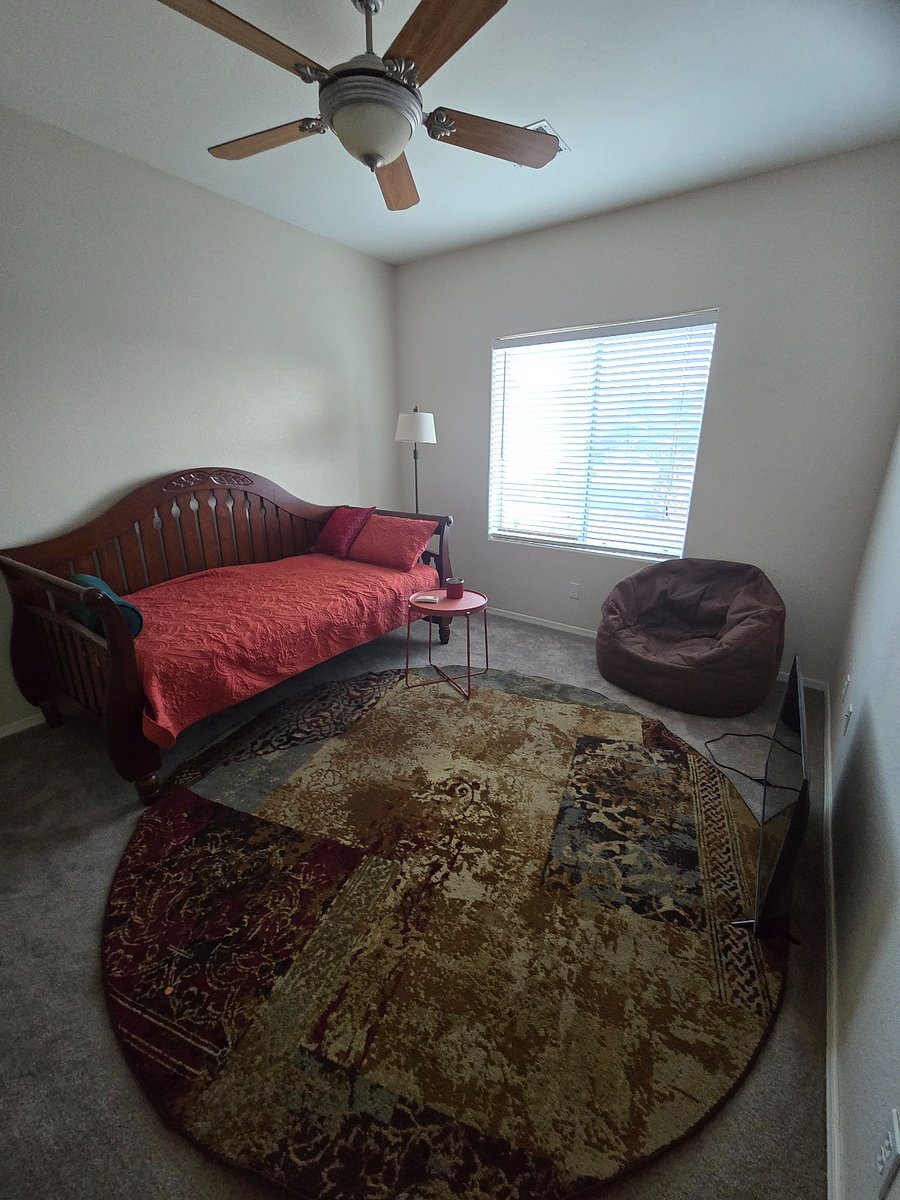 Front bedroom. Still being furnished with dresser, TV