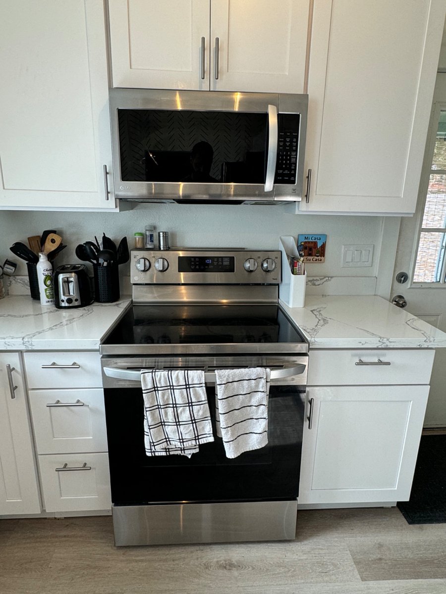 Shared kitchen. LG stainless steel appliances less than 2 years old. 