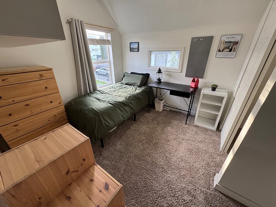 Upstairs room. Twin-size bed with space under bed for totes/boxes.