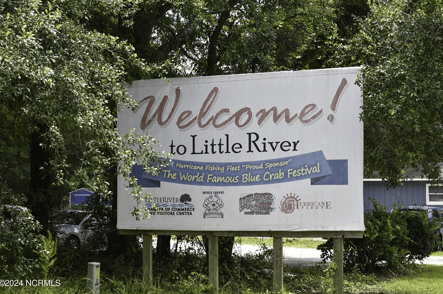 Little River waterfront community welcome sign.