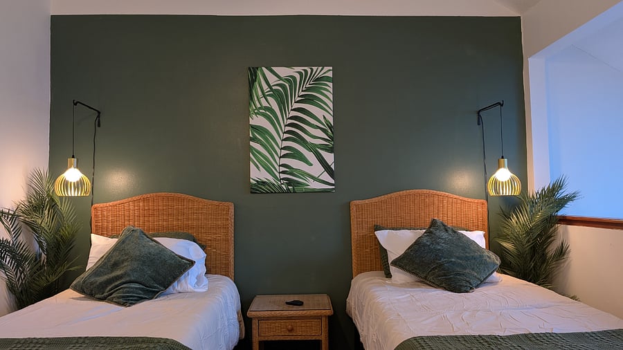 Loft area, and Bedroom 2. Invite up to 4 more guests to stay with you in this huge second floor loft. 2 Twins, 1 Queen, all with new memory foam mattresses.