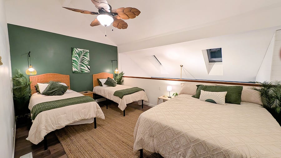 Loft area, and Bedroom 2. Invite up to 4 more guests to stay with you in this huge second floor loft. 2 Twins, 1 Queen, all with new memory foam mattresses.