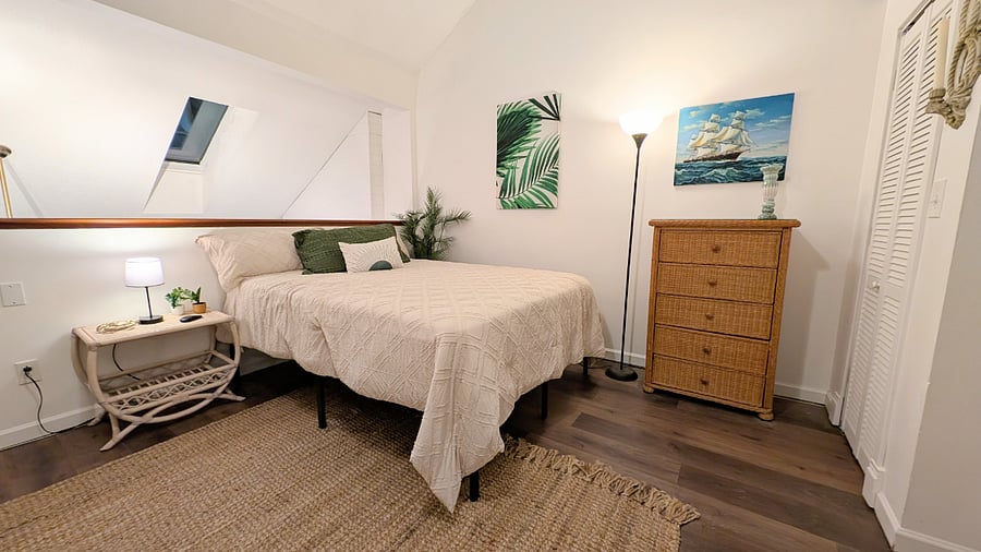 Loft area, and Bedroom 2. Invite up to 4 more guests to stay with you in this huge second floor loft. 2 Twins, 1 Queen, all with new memory foam mattresses.
