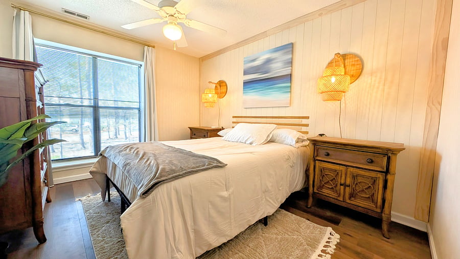 Spacious beachy-boho style master bedroom with full size mirror door closet, dresser, and comfy new queen-size memory foam mattress. This relaxing hideaway also has blackout curtains!