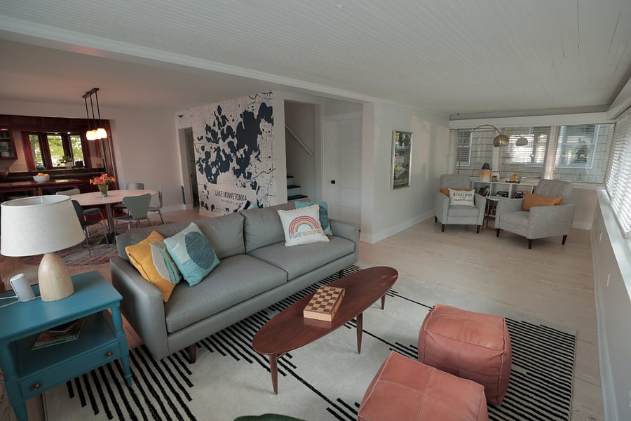 Two sitting areas in the front of the house with lots of window and light.