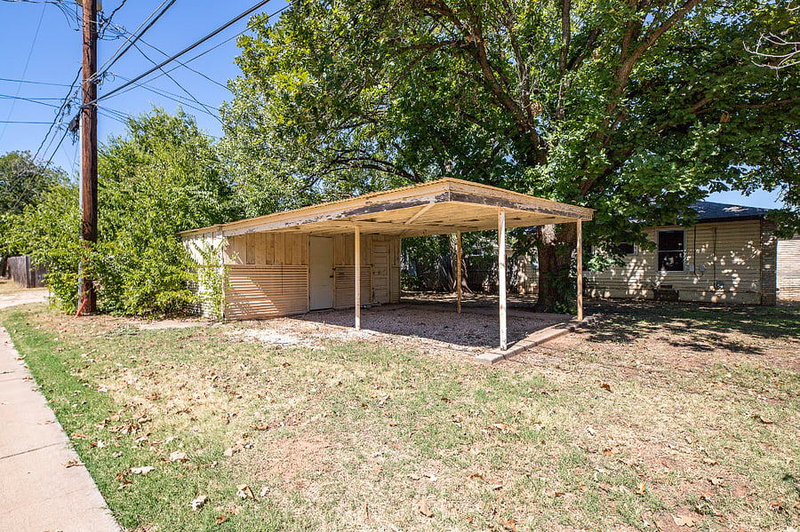 Guests have access to one covered spot behind the home and there is plenty of street parking in front.
