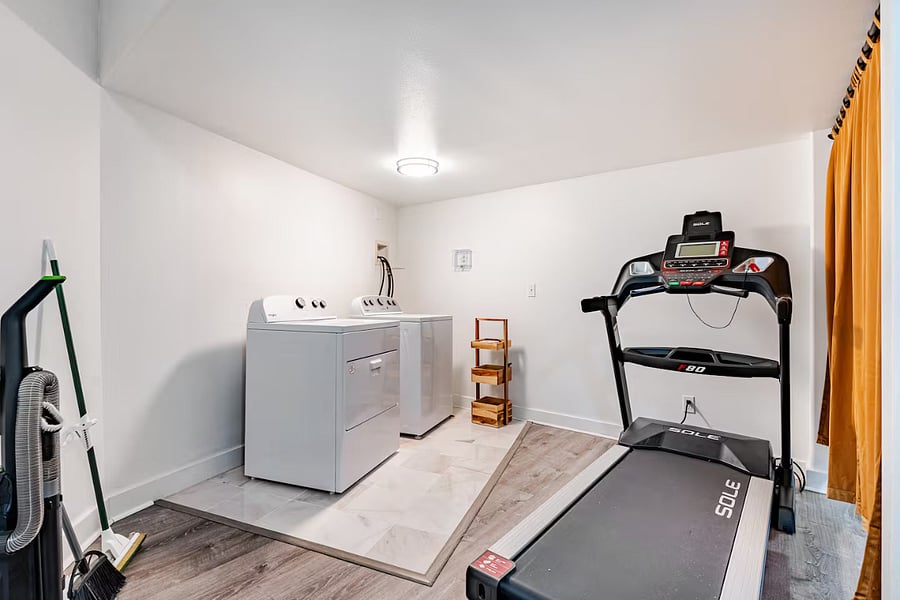 New washer machine and dryer in unit. Treadmill and fitness equipment available for use.
