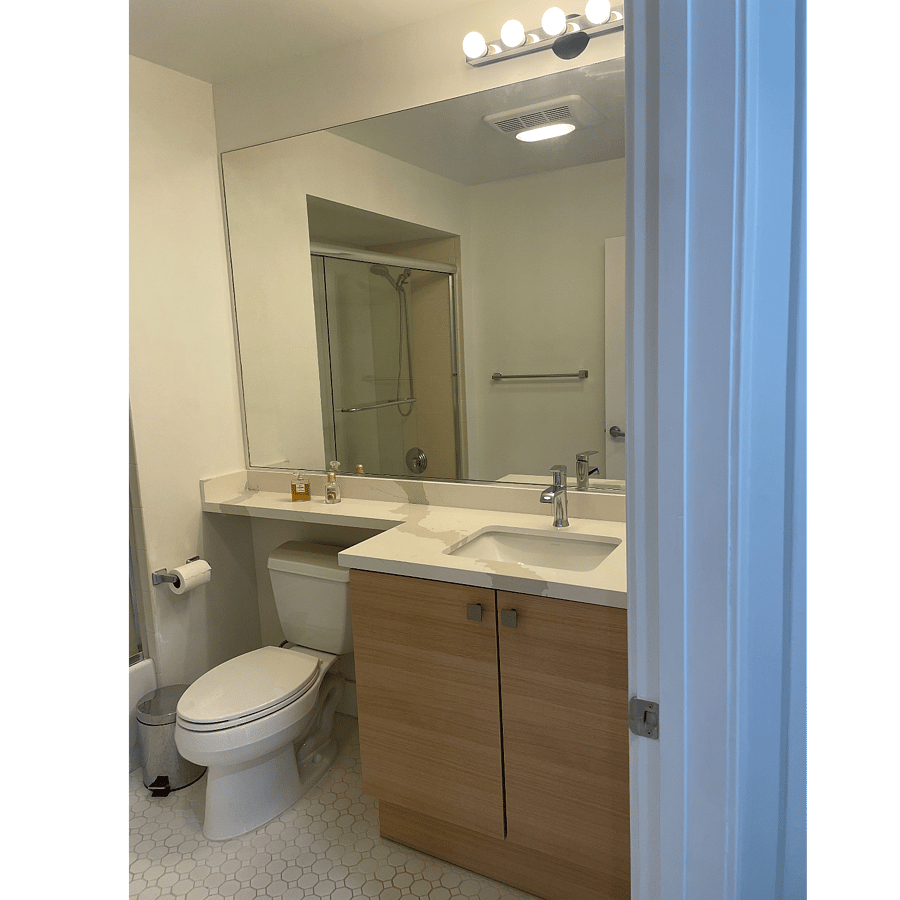 2nd bedroom bath; across. Entrance through hallway.