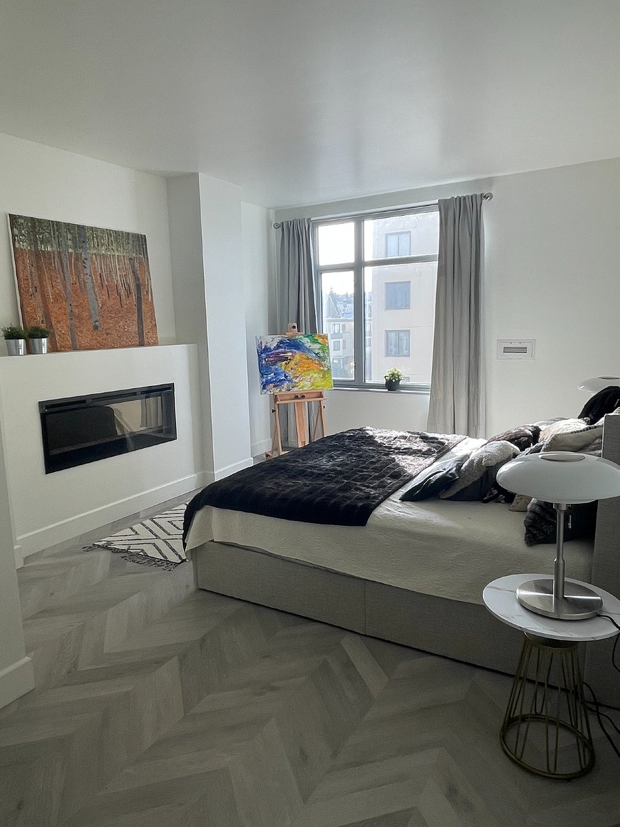 Master bedroom with electric fireplace