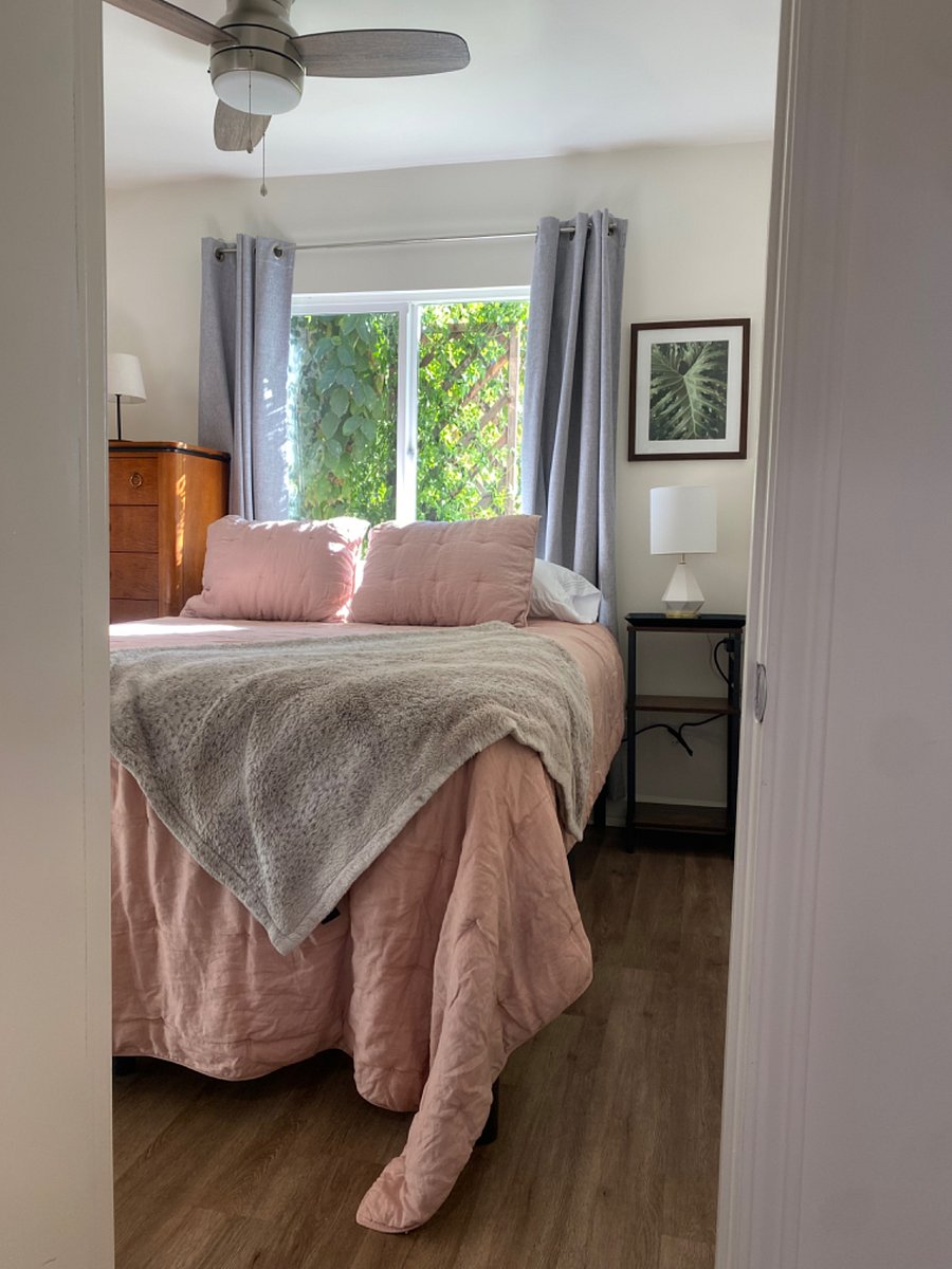 Mini split A/C, Queen size bed, tall dresser, nightstand, iron/board, hangers and plenty of under bed storage. 