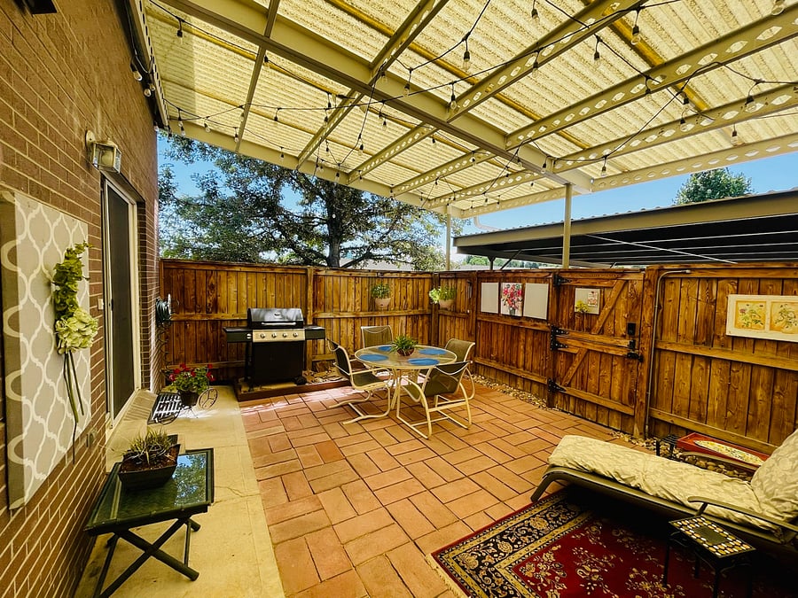 Covered back patio. So nice for eating outside or grilling.