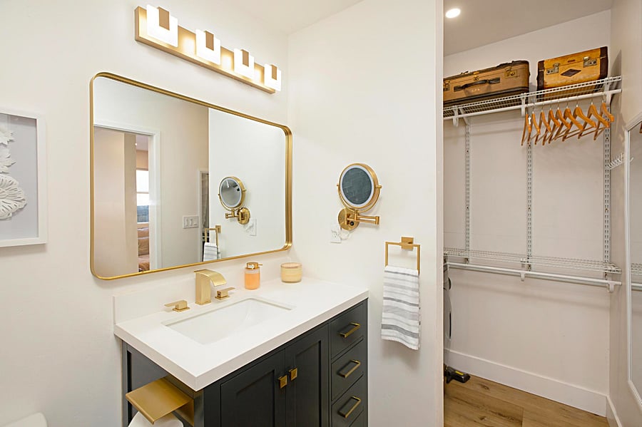 Clean, spacious bathroom with plenty of storage. 