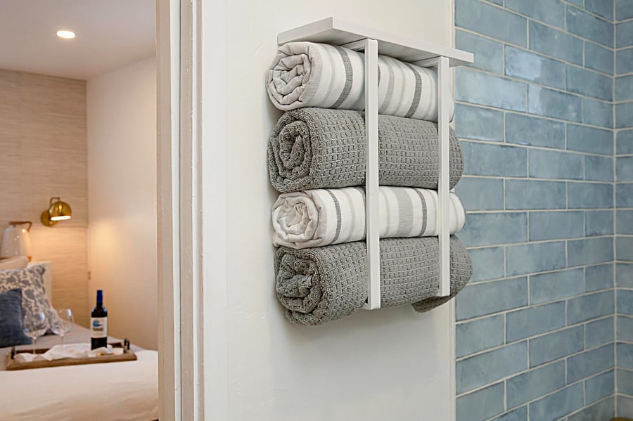 Fresh clean bath towels, washcloths, & hand towels.Receive starter quality Shampoo, conditioner, bar soap or body wash, & liquid hand soap. 