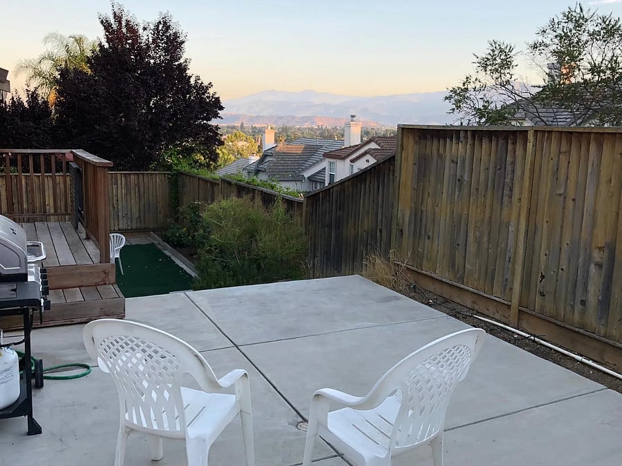 Step out from Kitchen to Upper level deck and back yard area. Views of Santa Cruz mountains.