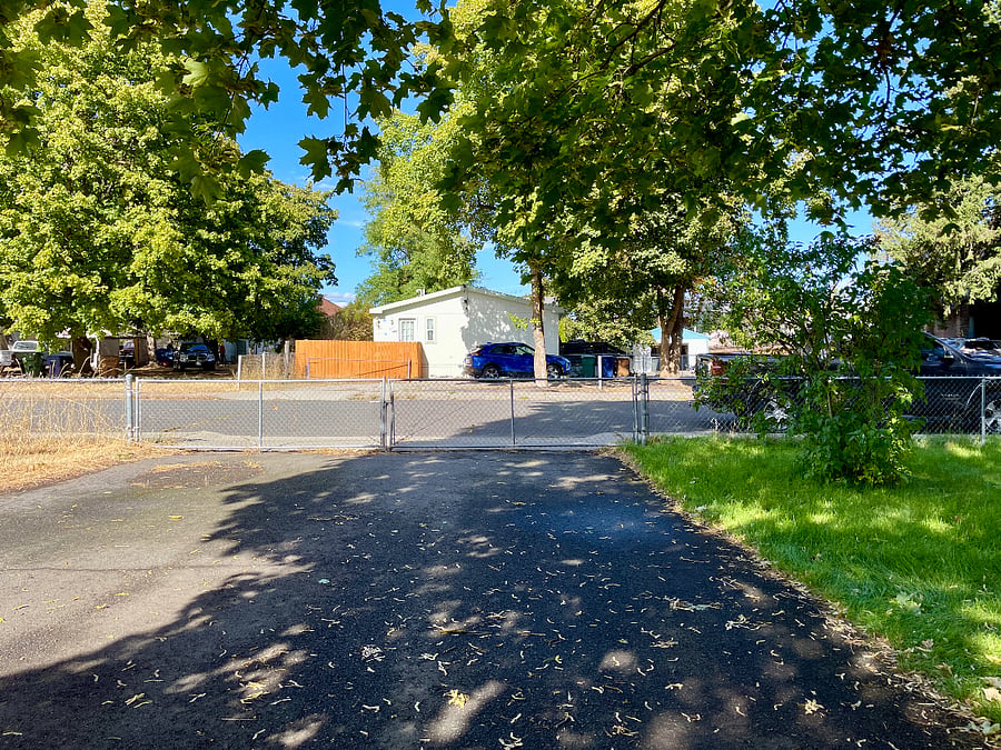 Fully fenced yard and driveway