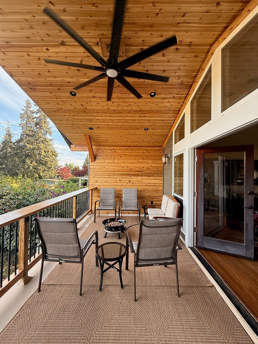 New covered deck- great place to have coffee in the morning- has a propane fireplace to keep the chill off!