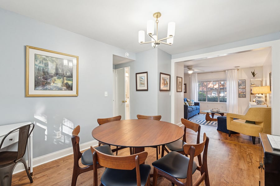 From the living room, you make your way into the dining area, which features a large 6-seater dining table. Perfect to enjoy your meals or to get some work done at. There is also a designated work-from-home desk in the corner if you'd prefer!