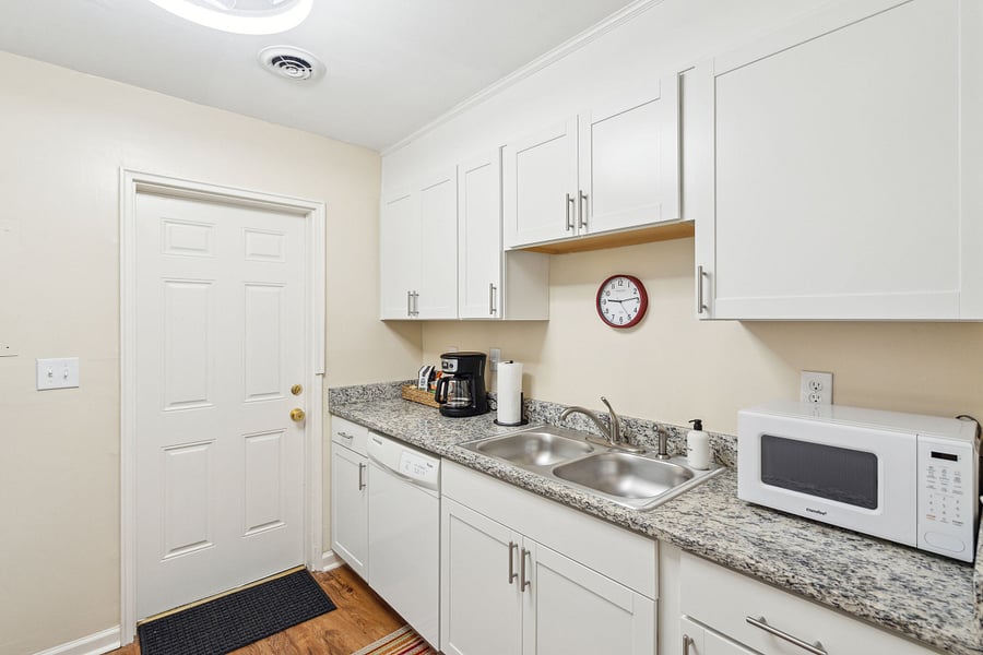 Off of the dining area is the galley-style kitchen. Fully equipped with all updated appliances and necessary culinary tools! We also provide a drip coffee maker with coffee, cream, and sugar.