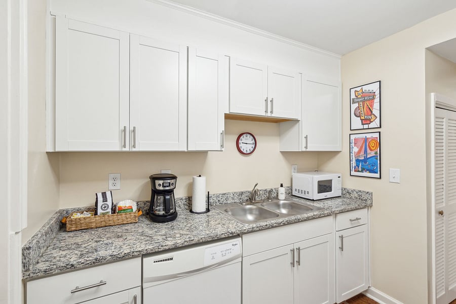 Off of the dining area is the galley-style kitchen. Fully equipped with all updated appliances and necessary culinary tools! We also provide a drip coffee maker with coffee, cream, and sugar.