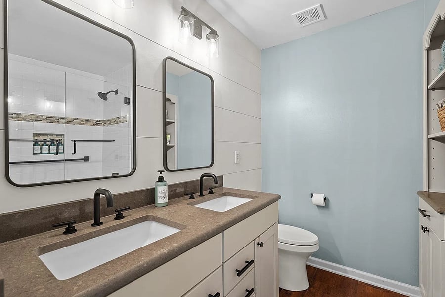 Renovated double sink bathroom in master bedroom