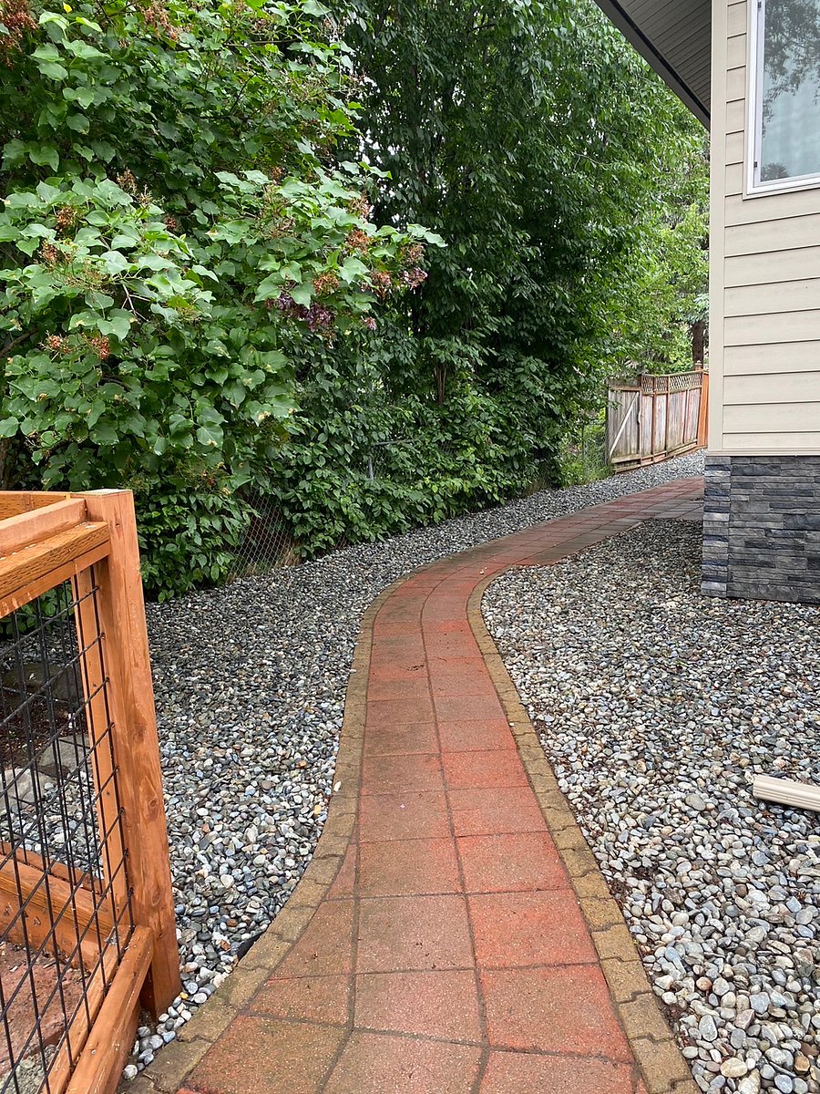 Low maintenance walkway and yard area.