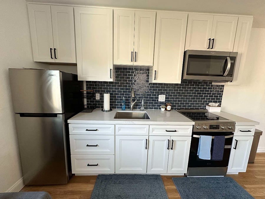 Kitchen w/ Fridge, Sink, Stove, Oven and Microwave