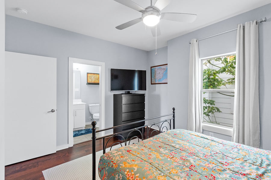 Enjoy the ultimate privacy with your own attached bathroom just steps from the bed. This room comes fully equipped with a large flat-screen smart TV, plenty of dresser storage, and gorgeous hardwood floors.