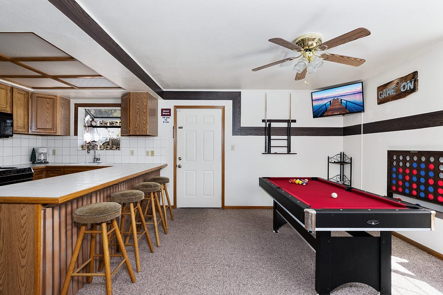 Watch your favorite football, soccer, or basketball game while enjoying a game on the pool table with your friends!