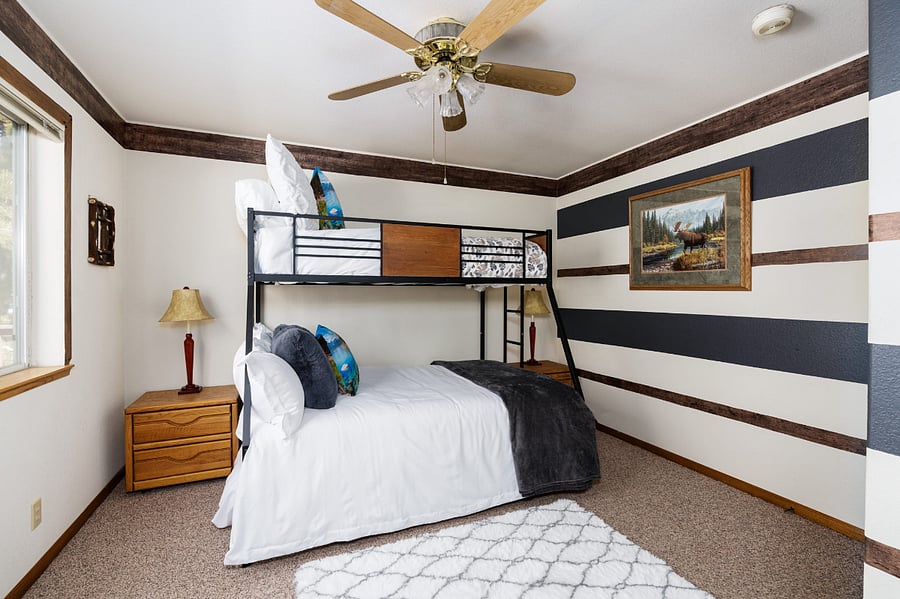 Bedroom 4 with triple bunk bed so 3 beds total.